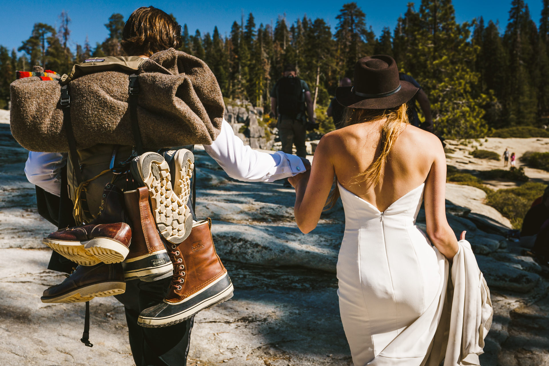 Couple heading to their elopement in Yosemite California