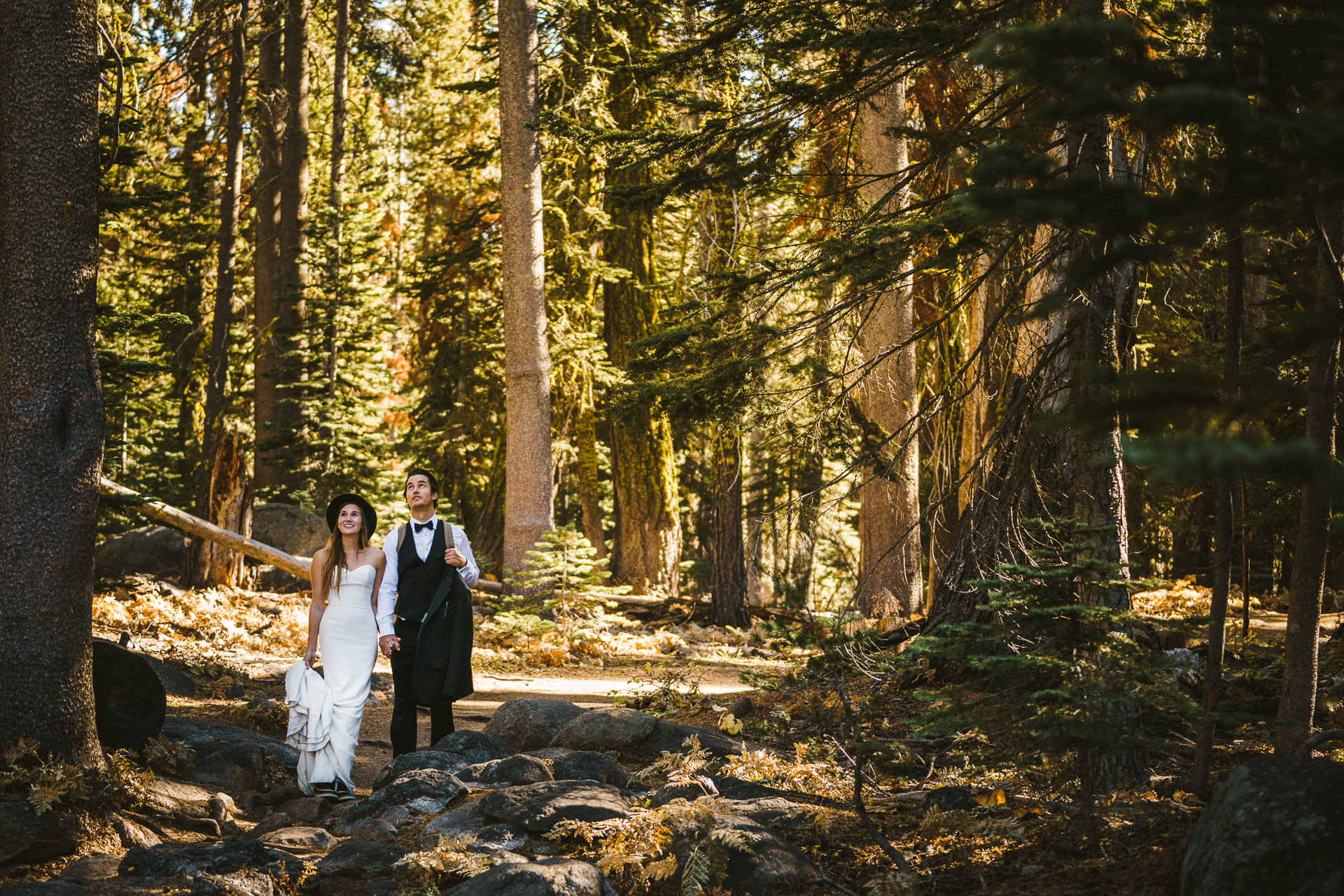 Couple heading to their elopement adventure wedding at Taft's Point in Yosemite California