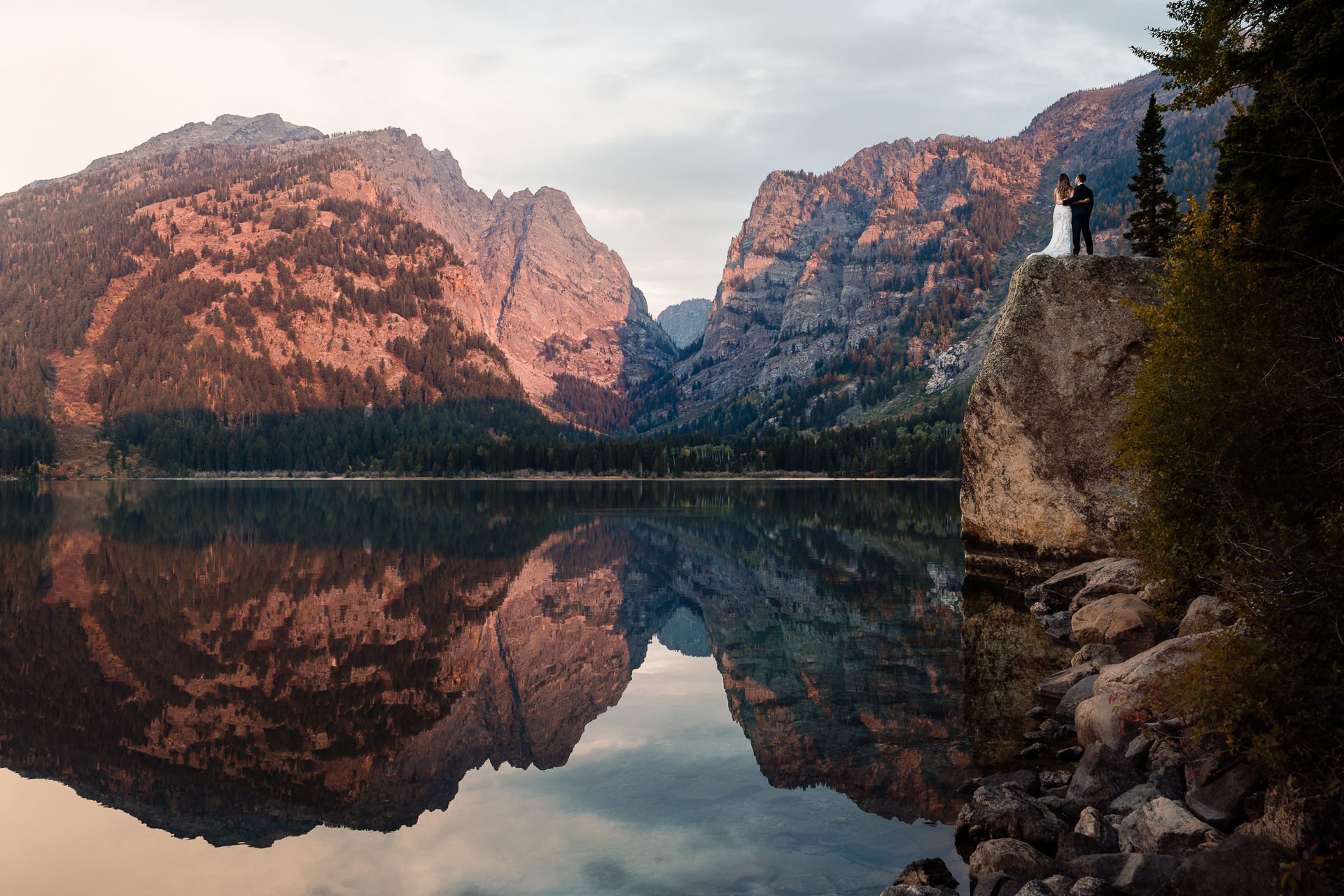 Bride and Groom watching sunset in Grant Teton National Park just prior to their elopement ceremony