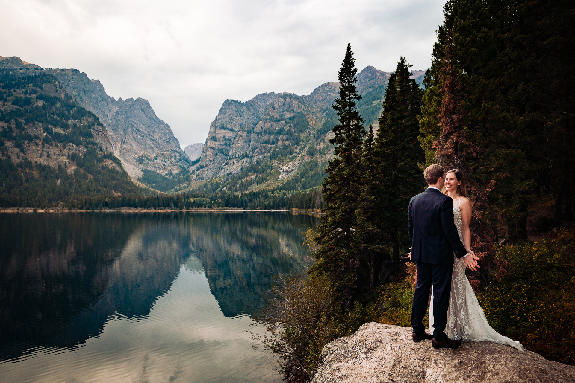 Couple enjoying the moment together just seconds after completing their self-uniting elopement in Grand Teton National Park
